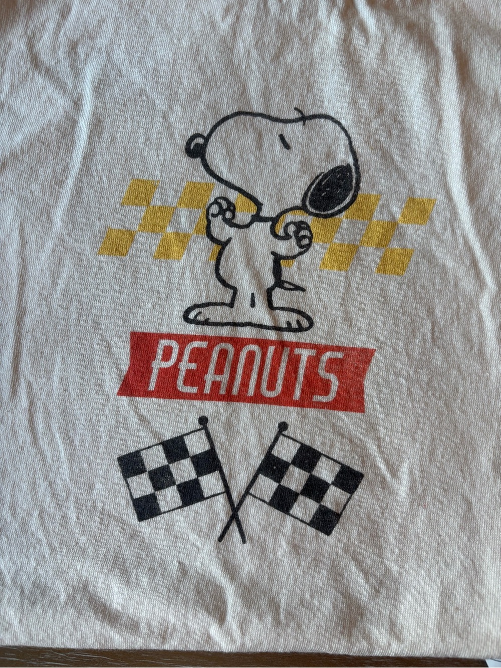 Peanuts White Tee with Snoopy and Yellow Accents